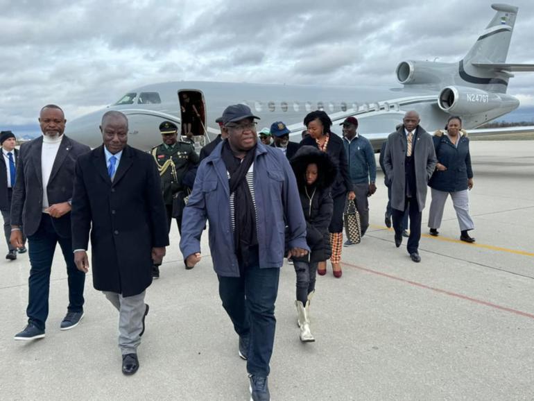 Sierra Leone's President Julius Maada Bio and entourage leaving the plane.