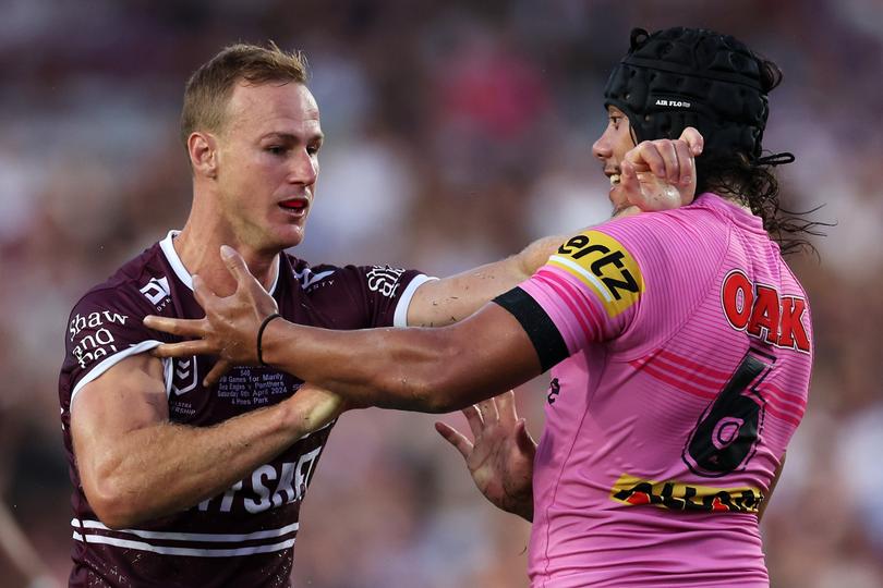 SYDNEY, AUSTRALIA - APRIL 06: Daly Cherry-Evans of the Sea Eagles and Jarome Luai of the Panthers scuffle during the round five NRL match between Manly Sea Eagles and Penrith Panthers at 4 Pines Park, on April 06, 2024, in Sydney, Australia. (Photo by Cameron Spencer/Getty Images)