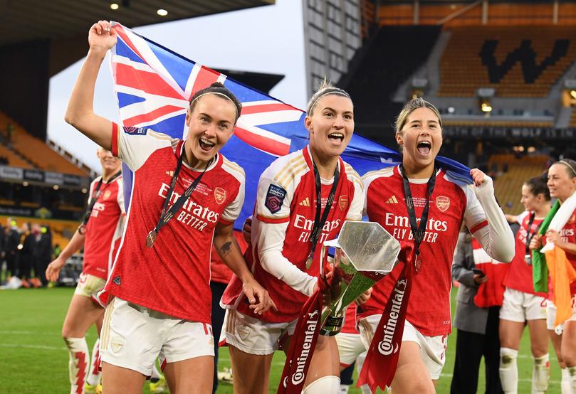 Matildas Caitlin Foord, Steph Catley and Kyra Cooney-Cross celebrate winning the FA Women's Continental Tyres League Cup Final for Arsenal last month.