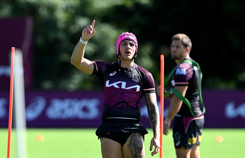 BRISBANE, AUSTRALIA - APRIL 08: Reece Walsh calls out to a trainer during a Brisbane Broncos NRL training session at Clive Berghofer Field on April 08, 2024 in Brisbane, Australia. (Photo by Bradley Kanaris/Getty Images)