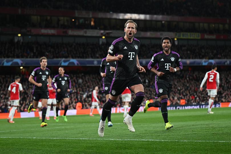 LONDON, ENGLAND - APRIL 09: Harry Kane of Bayern Munich celebrates scoring his team's second goal from a penalty during the UEFA Champions League quarter-final first leg match between Arsenal FC and FC Bayern München at Emirates Stadium on April 09, 2024 in London, England. (Photo by Shaun Botterill/Getty Images)