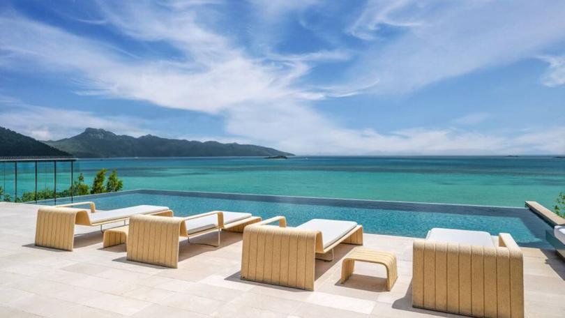 From the poolside lounges there are views across the Coral Sea and surrounding islands.