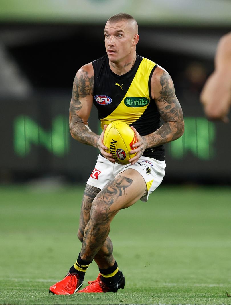 MELBOURNE, AUSTRALIA - MARCH 14: Dustin Martin of the Tigers in action during the 2024 AFL Round 01 match between the Carlton Blues and the Richmond Tigers at the Melbourne Cricket Ground on March 14, 2024 in Melbourne, Australia. (Photo by Michael Willson/AFL Photos via Getty Images)