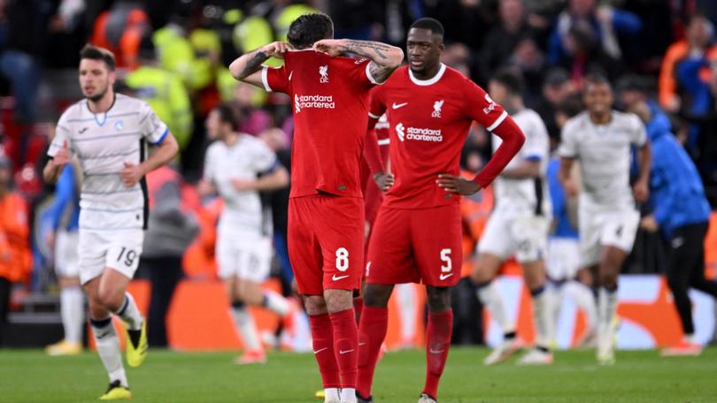 Dominik Szoboszlai of Liverpool reacts after Mario Pasalic of Atalanta BC scores his team's third goal during the UEFA Europa League Quarter-Final first leg match.