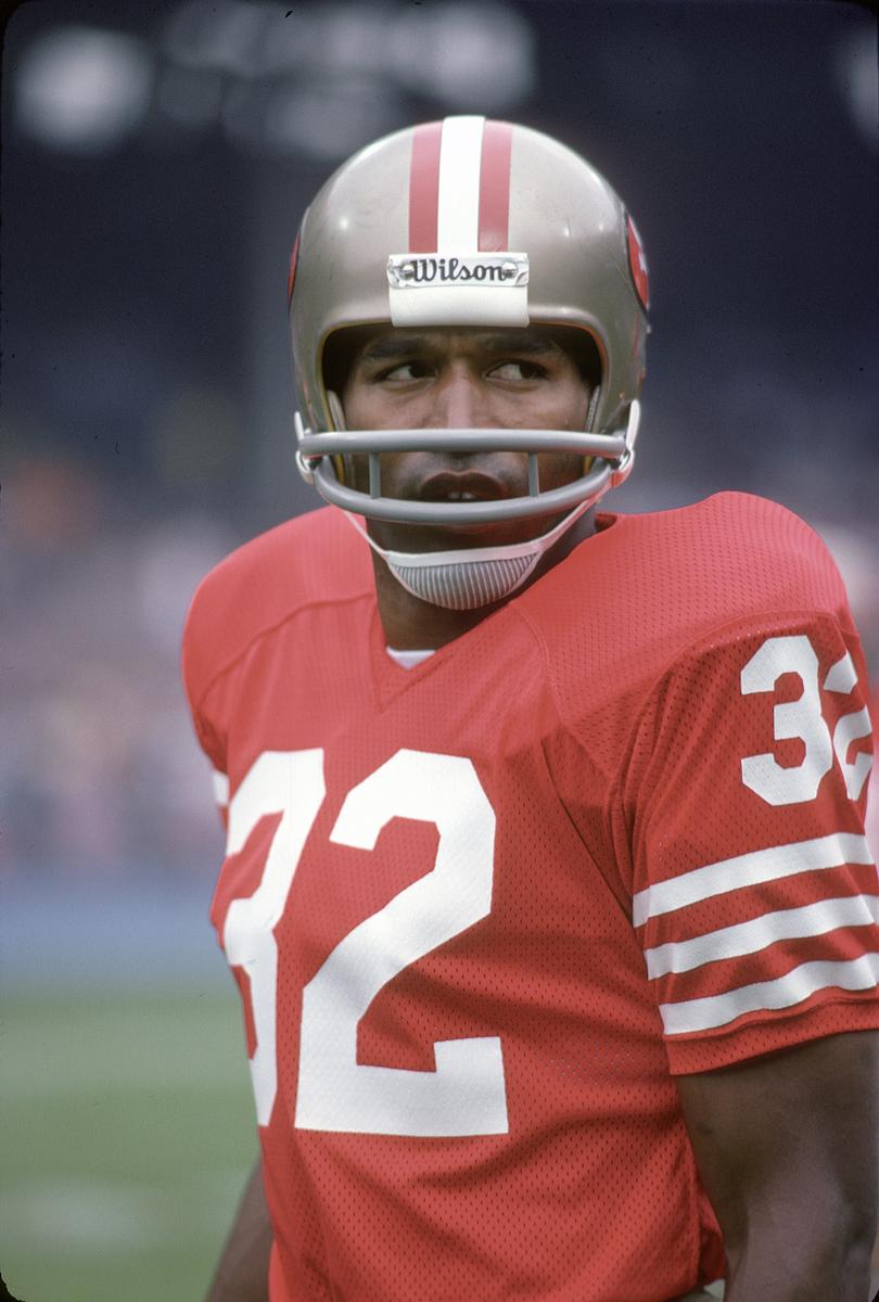 O.J. Simpson playing for the San Francisco 49ers.