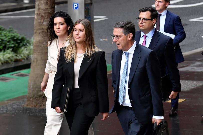 Brittany Higgins (centre) arrives at the Federal Court of Australia in Sydney, Tuesday, November 28, 2023. (AAP Image/Bianca De Marchi) NO ARCHIVING