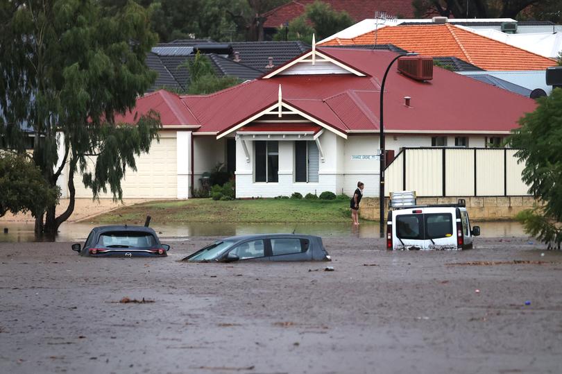 News. Wet Weather. Cars underwater at the corner of Ocean Grove Road and Riverlinks Drive in Clarkson. Jackson Flindell