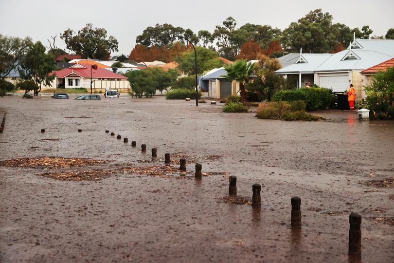 News. Wet Weather. Cars underwater at the corner of Ocean Grove Road and Riverlinks Drive in Clarkson. Jackson Flindell