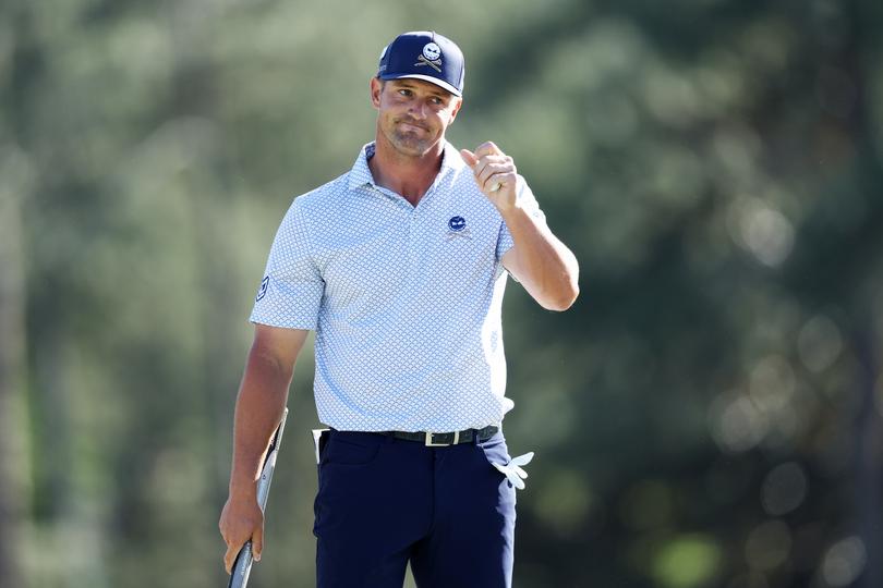 AUGUSTA, GEORGIA - APRIL 12: Bryson DeChambeau of the United States reacts on the 18th green during the second round of the 2024 Masters Tournament at Augusta National Golf Club on April 12, 2024 in Augusta, Georgia. (Photo by Warren Little/Getty Images)