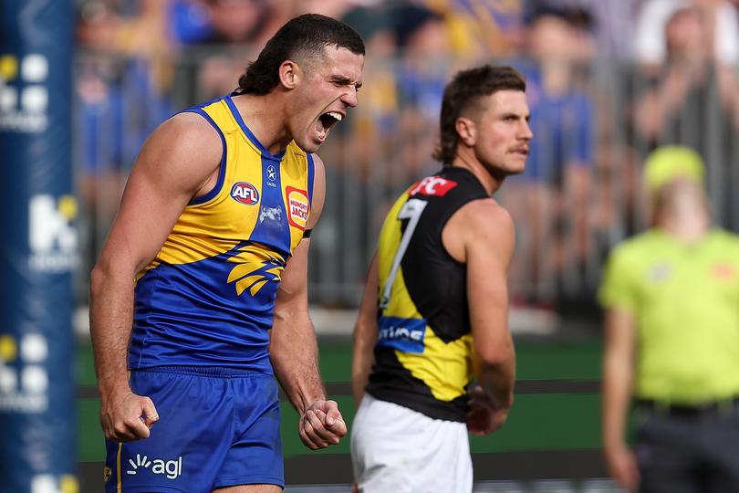 PERTH, AUSTRALIA - APRIL 14: Jake Waterman of the Eagles celebrates a goal during the round five AFL match between West Coast Eagles and Richmond Tigers at Optus Stadium, on April 14, 2024, in Perth, Australia. (Photo by Paul Kane/Getty Images)