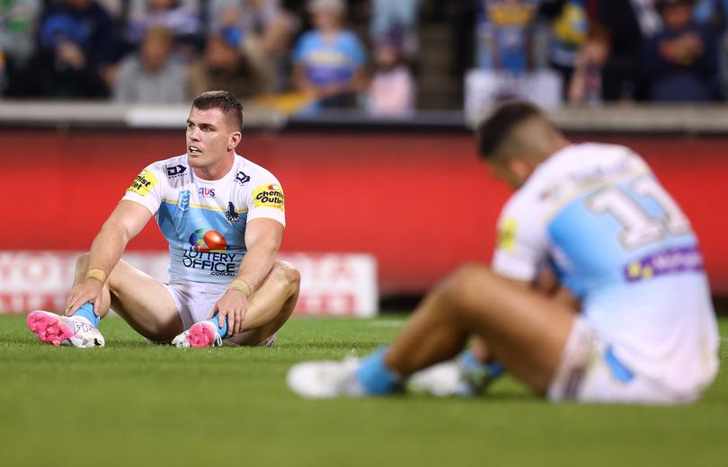 CANBERRA, AUSTRALIA - APRIL 14: Titans players look dejected during the round six NRL match between Canberra Raiders and Gold Coast Titans at GIO Stadium, on April 14, 2024, in Canberra, Australia. (Photo by Mark Nolan/Getty Images)