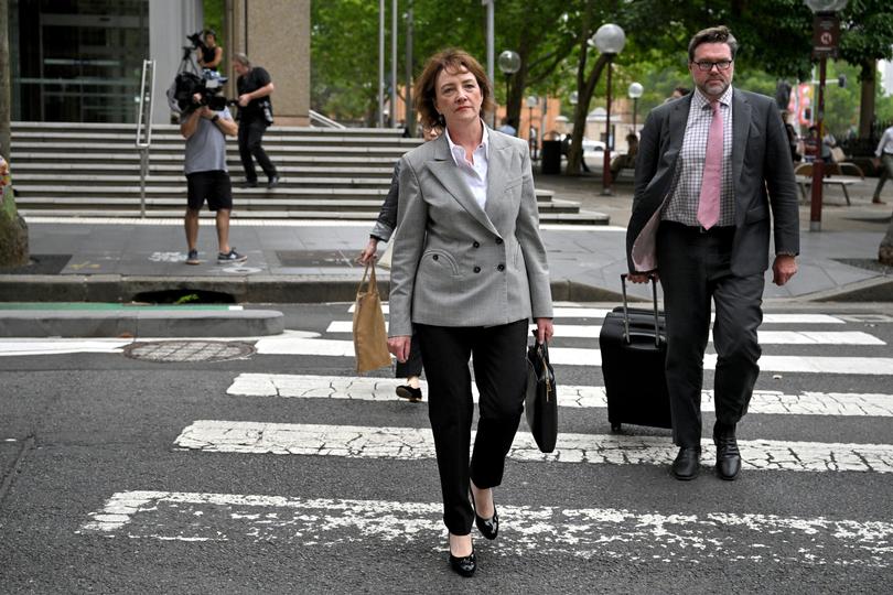 Former political staffer Fiona Brown leaves the Federal Court in Sydney, Tuesday, December 19, 2023. (AAP Image/Mick Tsikas) NO ARCHIVING