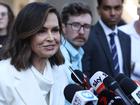 Lisa Wilkinson makes a statement to journalists after emerging from court.
