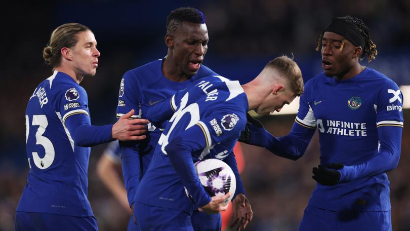 Cole Palmer and Nicolas Jackson clash ahead of a penalty kick, as Conor Gallagher and Noni Madueke react.