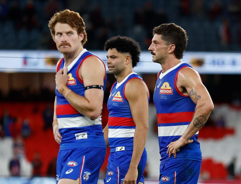 MELBOURNE, AUSTRALIA - APRIL 12: Tom Liberatore of the Bulldogs (right) is seen post-match during the 2024 AFL Round 05 match between the Western Bulldogs and the Essendon Bombers at Marvel Stadium on April 12, 2024 in Melbourne, Australia. (Photo by Michael Willson/AFL Photos via Getty Images)