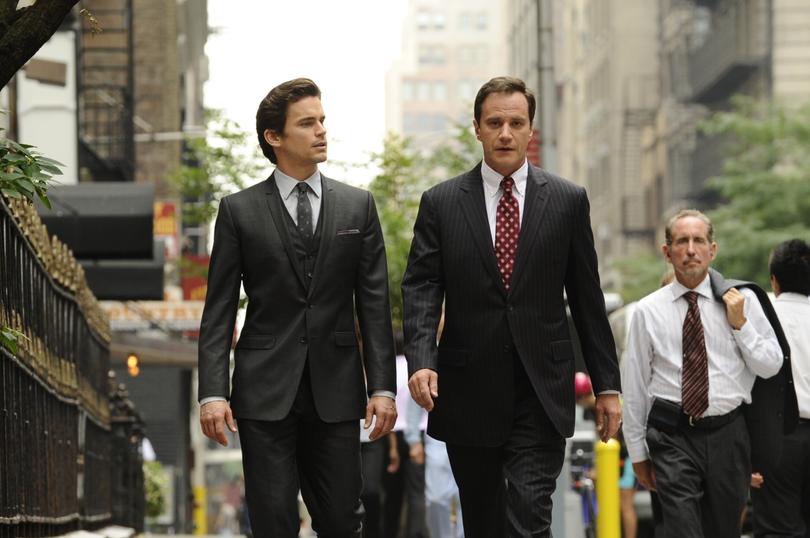 Matt Bomer as Neal Caffrey and 
Tim DeKay as Peter Burke in White Collar