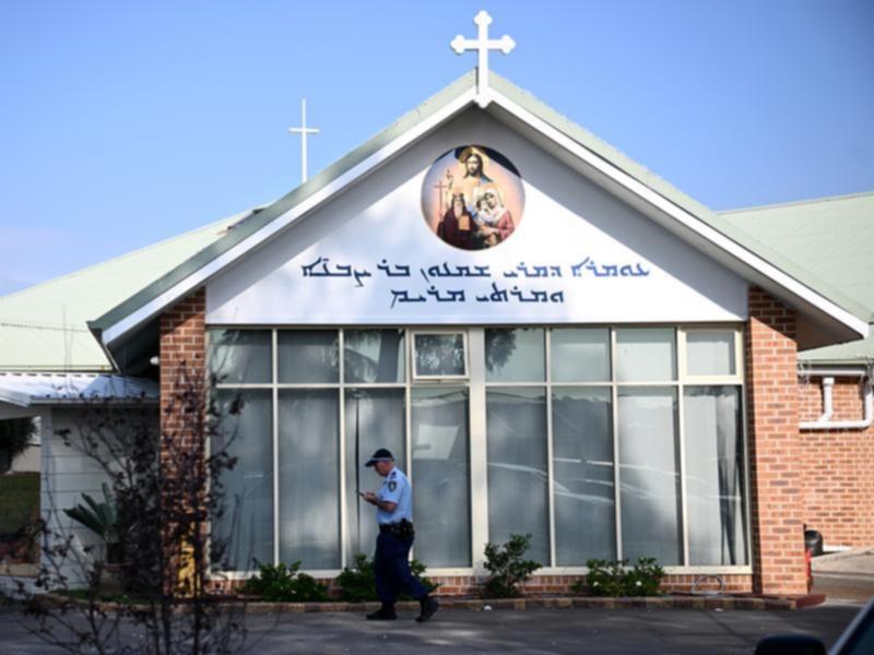 Police are seen at Christ The Good Shepherd Church