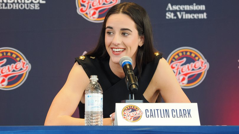 Caitlin Clark of the Indiana Fever talks to the media.