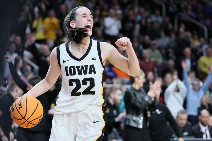 ALBANY, NEW YORK - APRIL 01: Caitlin Clark #22 of the Iowa Hawkeyes celebrates after beating the LSU Tigers 94-47 in the Elite 8 round of the NCAA Women's Basketball Tournament at MVP Arena on April 01, 2024 in Albany, New York. (Photo by Andy Lyons/Getty Images) *** BESTPIX ***