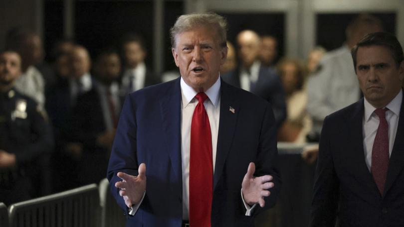 Former President Donald Trump speaks to reporters outside the courtroom on the first day of his criminal trial at Manhattan Criminal Court in New York. (Jefferson Siegel/The New York Times)