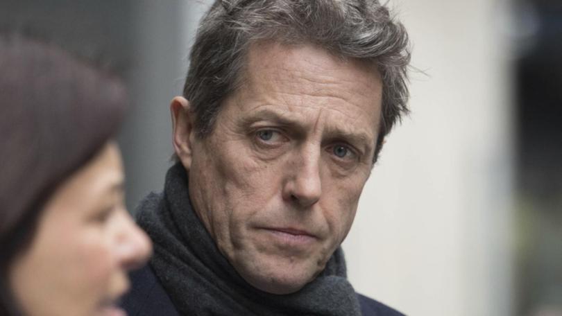Hugh Grant sued News Group Newspapers for alleged widespread unlawful information gathering. (AP PHOTO)