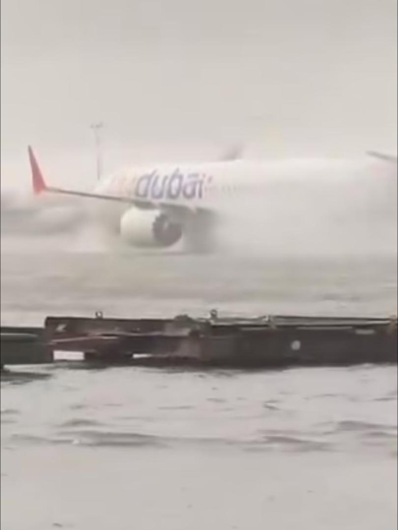 Dubai flooded - Planes are caught in intense flooding at Dubai International Airport today