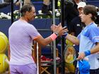 Rafael Nadal smiles while congratulating his conqueror Alex de Minaur at the Barcelona Open. (EPA PHOTO)