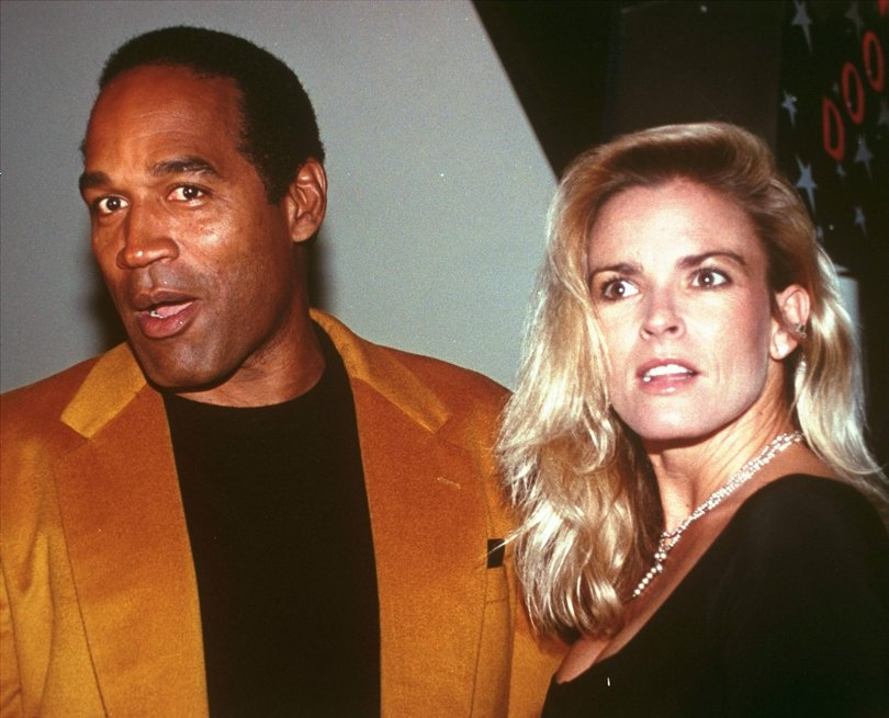 O.J. Simpson and his wife, Nicole Brown Simpson, celebrate the opening of the Harley-Davidson Cafe in this Oct. 19, 1993 file photo. O.J. Simpson created an uproar Wednesday, Nov. 15, 2006 with plans for a TV interview and book titled "If I Did It". Fox, which plans to air an interview with Simpson Nov. 27 and 29, said Simpson describes how he would have committed the 1994 slayings of his ex-wife, Nicole Brown Simpson, and her friend Ronald Goldman, "if he were the one responsible."