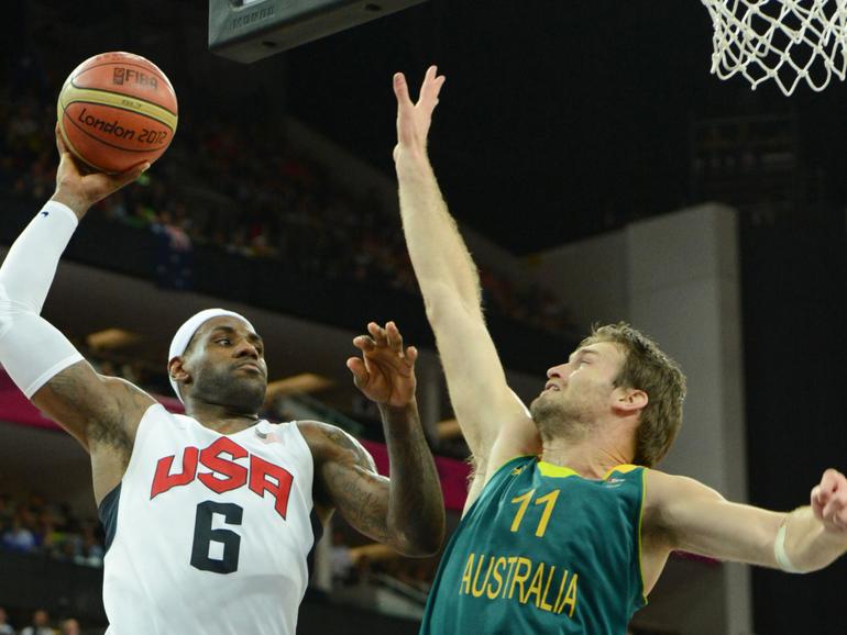US forward LeBron James scores past Australian forward Mark Worthington during their London 2012 Olympic Games