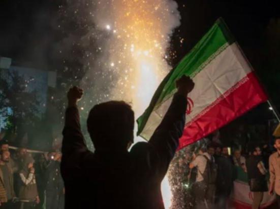 People gather in support of the Islamic Revolutionary Guard Corps’ attack on Israel on April 14, 2024 in Tehran, Iran. Late on Saturday, Iran launched a direct attack at Israel, about two weeks following the Israeli attack on the Iranian consulate in Syria.