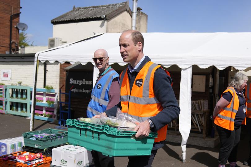 William attended the food charity Surplus to Supper in Surrey to help out with cooking and loading meals into delivery vans.

