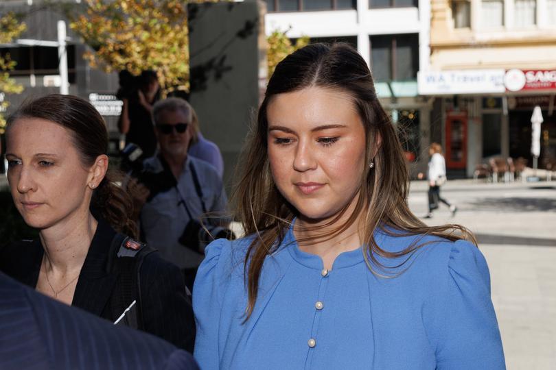 Brittany Higgins arrives at the David Malcolm Justice Centre in Perth, Tuesday, March 5, 2024. Brittany Higgins and her partner David Sharaz are meeting with Liberal senator Linda Reynolds for mediation talks as part of an ongoing defamation matter. (AAP Image/Richard Wainwright) NO ARCHIVING