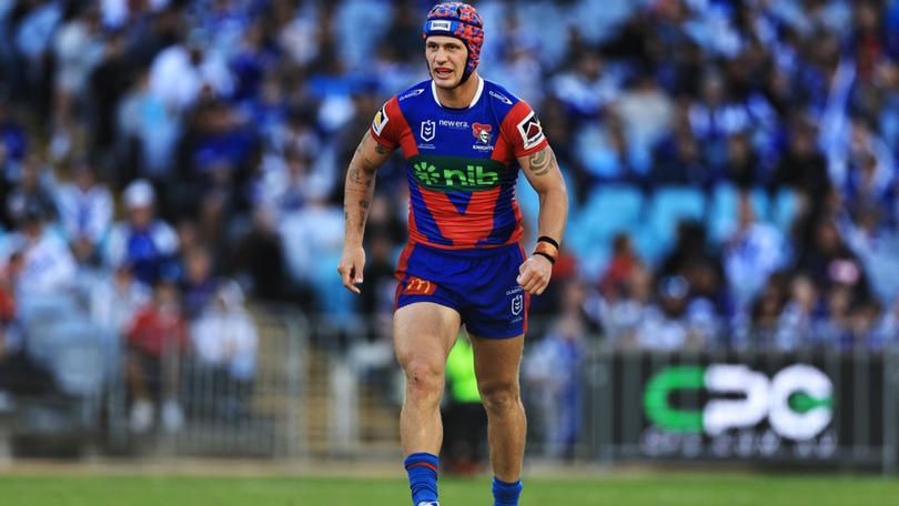 Kalyn Ponga limps after suffering a foot injury.