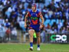 Kalyn Ponga limps after suffering a foot injury.
