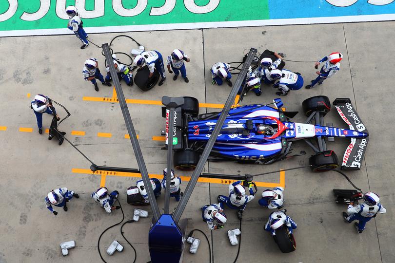 Daniel Ricciardo of Australia driving the (3) Visa Cash App RB VCARB 01 makes a pitstop.
