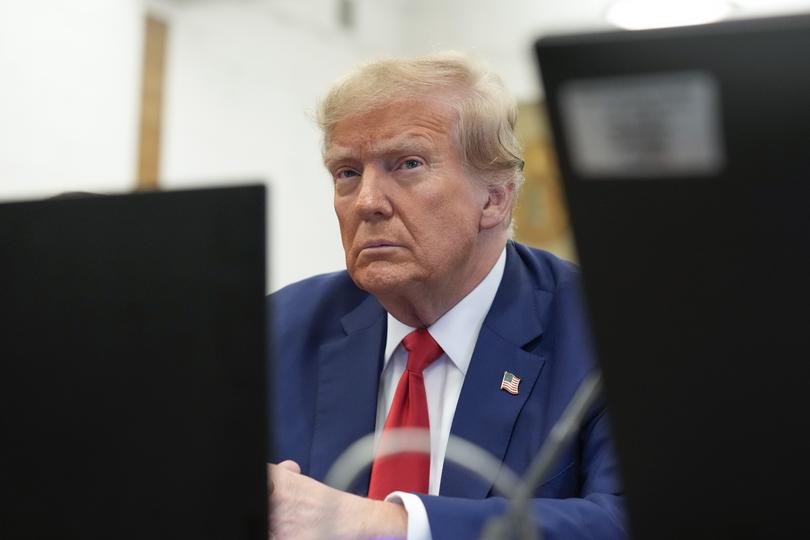 FILE - Former President Donald Trump sits in the courtroom before the start of closing arguments in his civil business fraud trial at New York Supreme Court, Jan. 11, 2024, in New York. Judge Anil Singh, a New York appellate judge, has refused to halt collection of Trump's $454 million civil fraud penalty while he appeals, rejecting the former president's request that he be allowed to post a bond covering just a fraction of what he owes.(AP Photo/Seth Wenig, Pool, File)