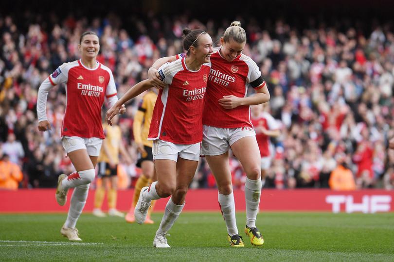 Alessia Russo of Arsenal celebrates with teammate Caitlin Foord after scoring her team's second goal during the Barclays Women's Super League match between Arsenal FC and Leicester City on Sunday.