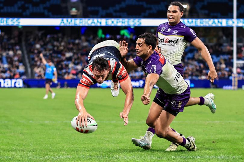 Joseph Manu scores a try against the Melbourne Storm on Thursday.