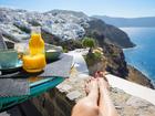 Woman enjoying morning in beautiful Santorini