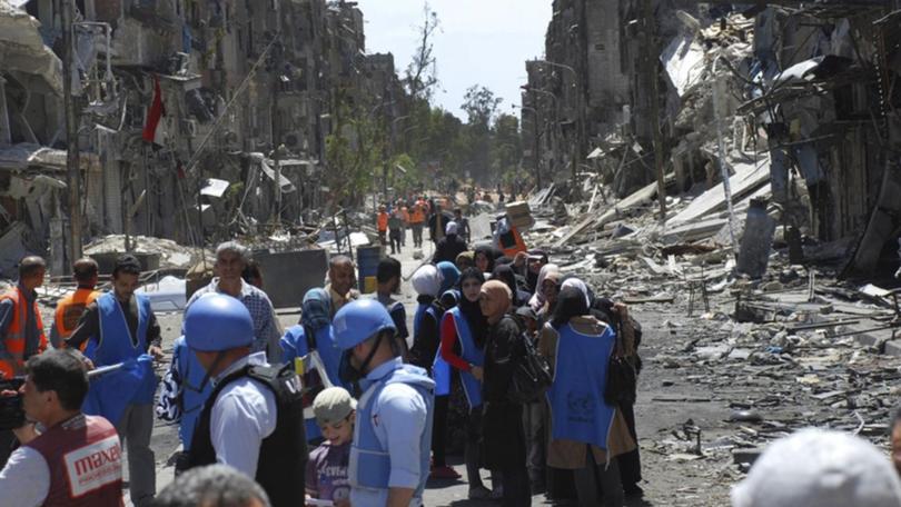 Israel has not yet proved UNRWA staff are members of terrorist organisations, a report has found. (AP PHOTO)