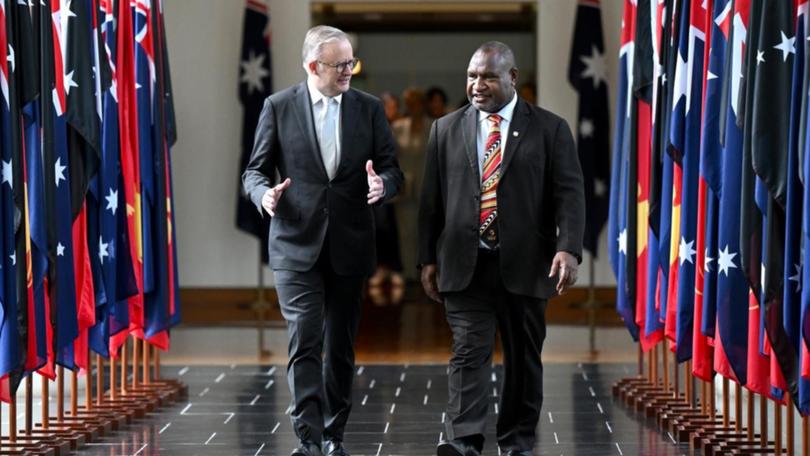 Anthony Albanese and PNG Prime Minister James Marape are on the final leg of their walk. (Lukas Coch/AAP PHOTOS)