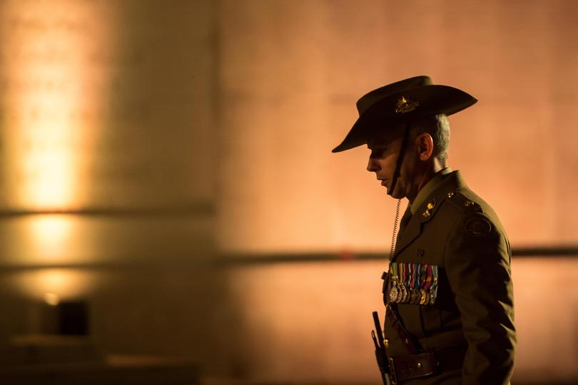 An Australian serviceman attends Anzac Day ceremonies at the military cemetery of the Australian National Memorial in Villers-Bretonneux, northern France, on April 25, 2017. 