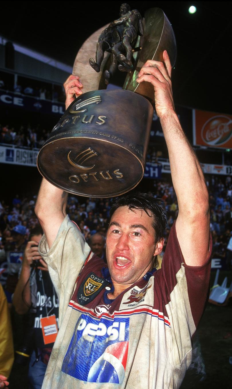 Terry Hill holds aloft the winners trophy after the ARL Grand Final between the Manly Warringah Sea Eagles and the St George Dragons in 1996.