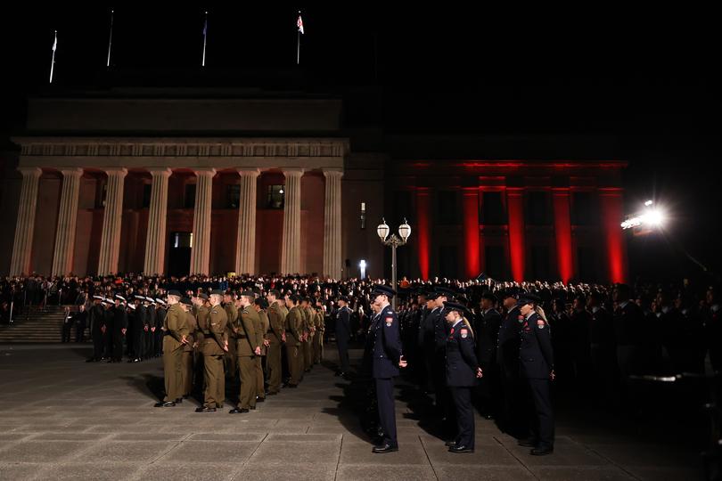 AUCKLAND, NEW ZEALAND - APRIL 25: Aucklanders attend the Anzac Day Dawn Service at Auckland Museum on April 25, 2024 in Auckland, New Zealand. Anzac day is a national holiday in New Zealand, marked by a dawn service held during the time of the original Gallipoli landing and commemorated with ceremonies and parades throughout the day. (Photo by Fiona Goodall/Getty Images for Auckland War Memorial Museum)