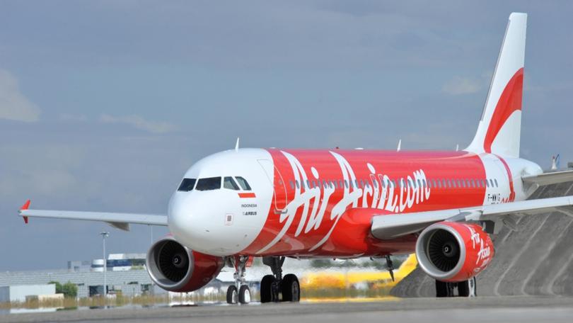 Passengers on an AirAsia flight have reported a power failure on board, leading to panic.