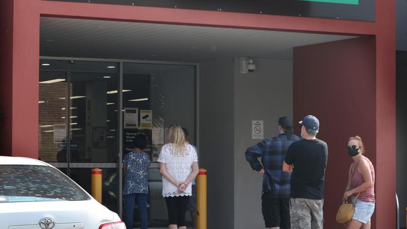 A massive backlog in Centrelink and Medicare claims has almost halved in just 10 weeks.