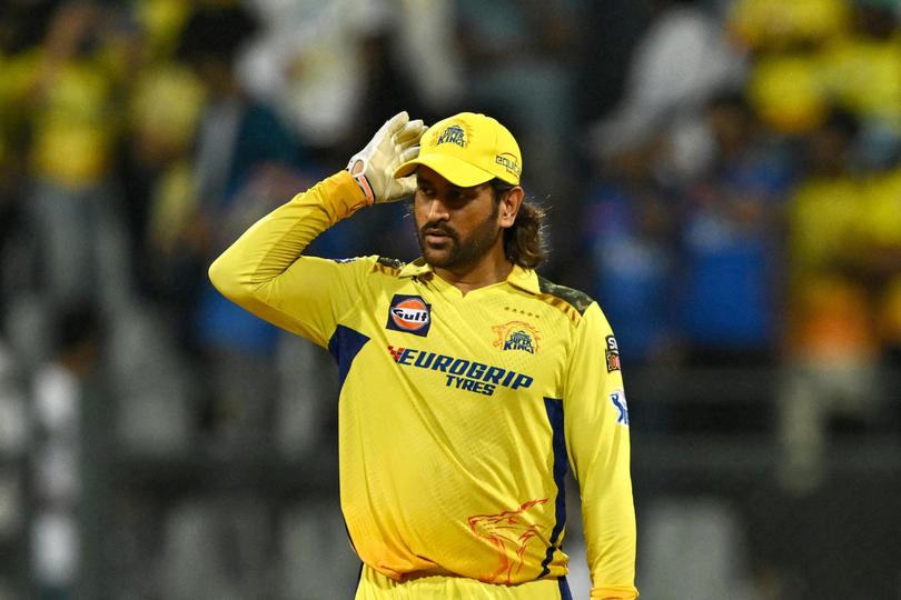 Chennai Super Kings' wicketkeeper MS Dhoni looks on during the Indian Premier League (IPL) Twenty20 cricket match between Mumbai Indians and Chennai Super Kings at the Wankhede Stadium in Mumbai on April 14, 2024. 