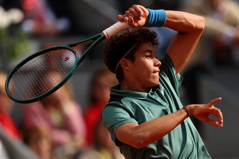 MADRID, SPAIN - APRIL 25: Darwin Blanch of USA plays a forehand against Rafael Nadal of Spain on Day Two during their 1st Round match of the Mutua Madrid Open at La Caja Magica on April 25, 2024 in Madrid, Spain. (Photo by Clive Brunskill/Getty Images)