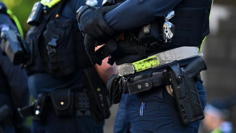 Victoria Police data shows 78 officers are facing charges for criminal or traffic offences. (James Ross/AAP PHOTOS)