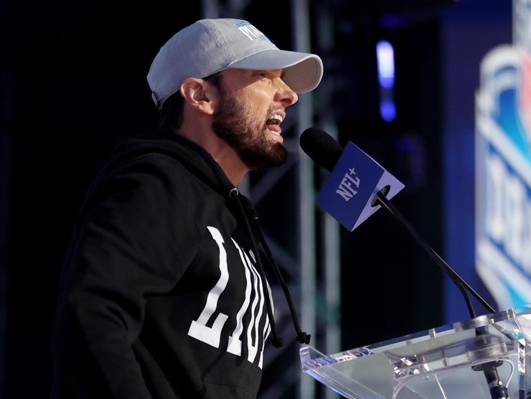Rapper Marshall "Eminem" Mathers speaks during the first round of the 2024 NFL Draft.